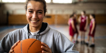 attractive coach with ball